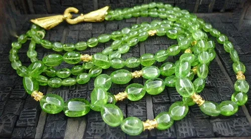 CHURCHILL Private Label Peridot Torsade Necklace with 22K Yellow Gold Beads and Closure