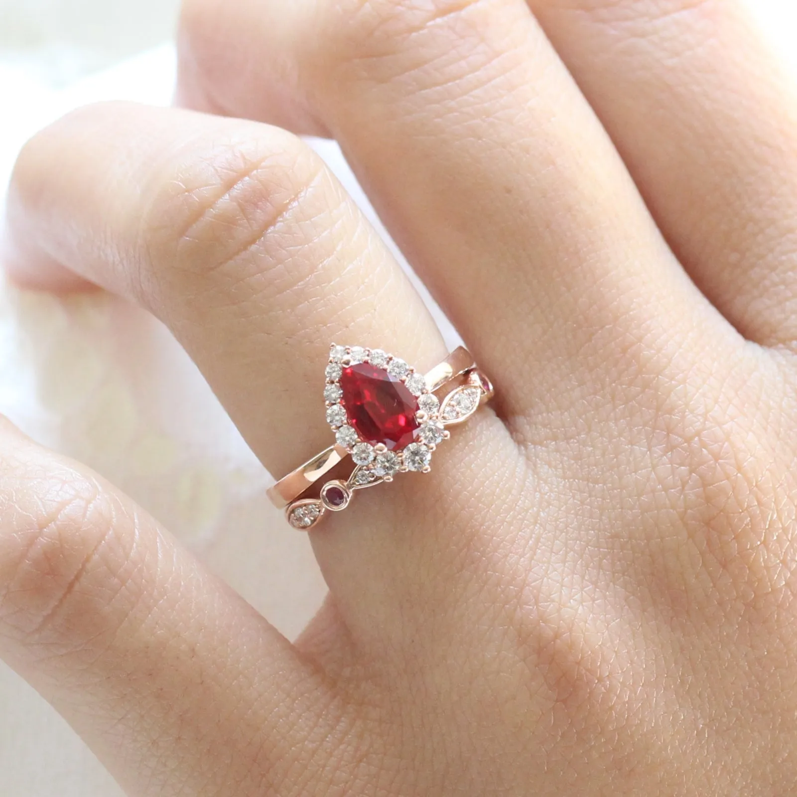 Pear Ruby Engagement Ring in Tiara Halo Diamond Tapered Band