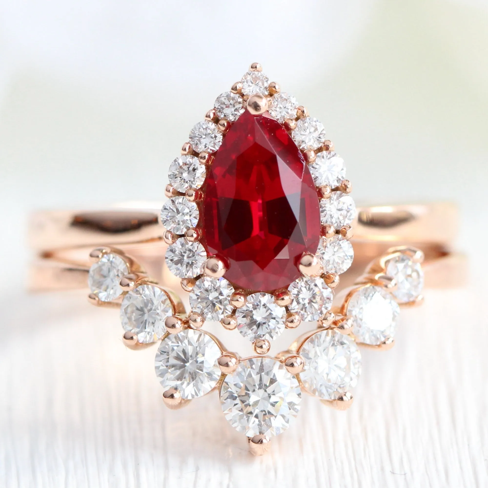 Pear Ruby Engagement Ring in Tiara Halo Diamond Tapered Band