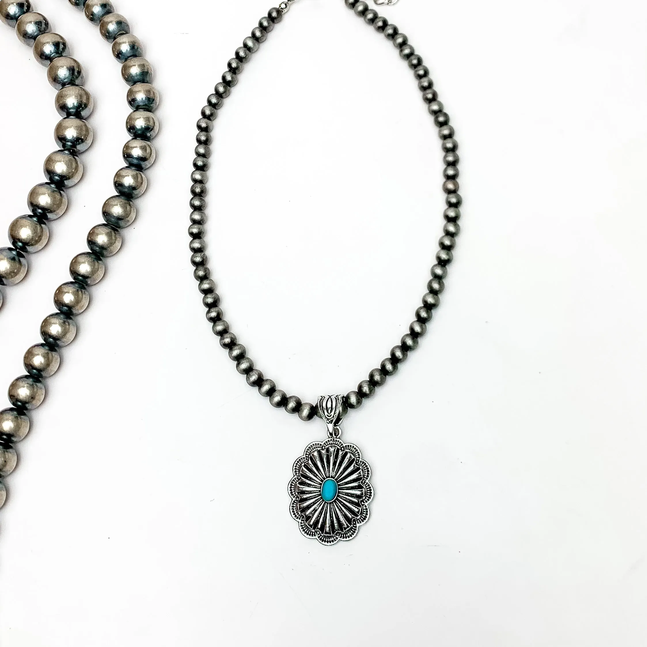 Silver Tone Pearl Necklace Featuring a Pendent With Turquoise Blue Stone